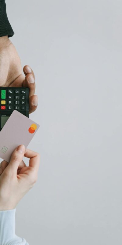 Modern contactless payment using a card and terminal, highlighting the ease of digital transactions.